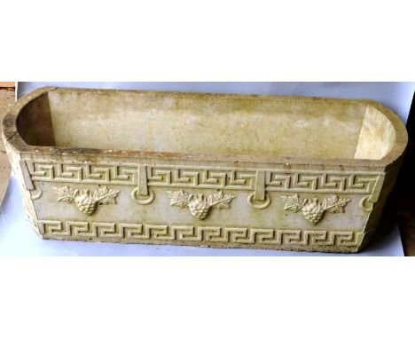 A RECONSTITUTED STONE GARDEN TROUGH. 3ft 0ins long.