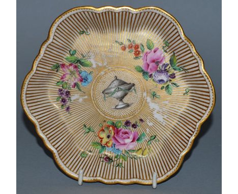 AN 18TH CENTURY DERBY TEAPOT STAND painted with a classical urn, flowers and gilt radiating lines by James Giles in London an