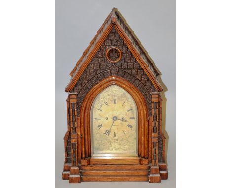 A GOOD 19TH CENTURY “GOTHIC” OAK BRACKET CLOCK AND BRACKET by LAST, YARMOUTH, with eight day movement, engraved brass dial, s