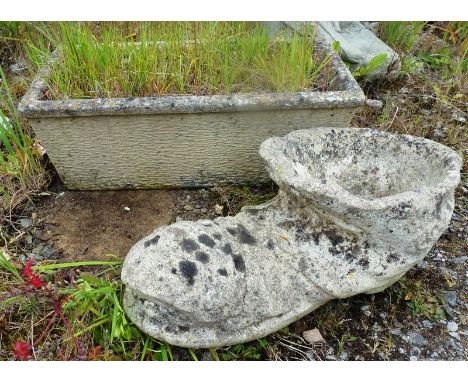 A RECONSTITUTED STONE SMALL GARDEN TROUGH and a SMALL PLANTER modelled as a boot! (2).