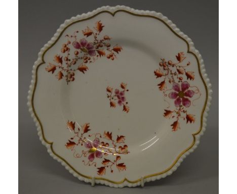 A 19TH CENTURY WORCESTER FLIGHT BARR AND BARR PLATE painted in imari style, printed and impressed marks, and a pair of Flight