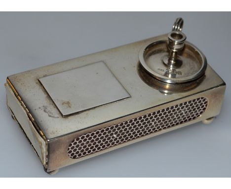 AN EDWARD VI SILVER MATCHBOX HOLDER with applied chamber stick. London 1904.