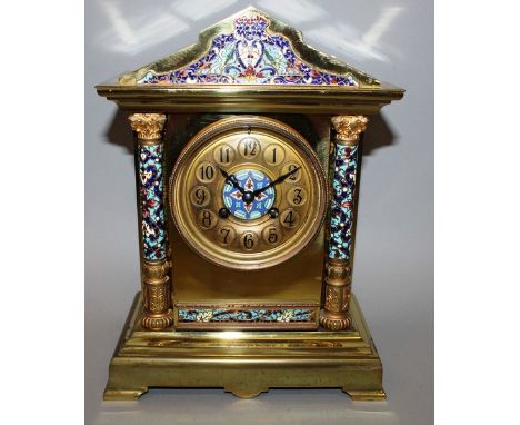 A 19TH CENTURY FRENCH CHAMPLEVE ENAMEL, ORMOLU AND ONYX CLOCK of architectural form, column sides, eight day movement, striki