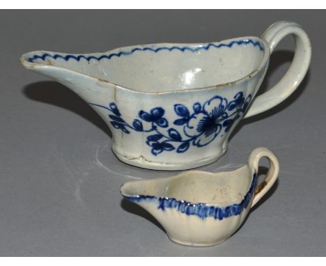 AN 18TH CENTURY PEARL WARE MINIATURE SAUCEBOAT with feathered blue border, a slightly larger pearl ware sauceboat and a 19th 