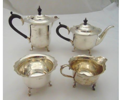 A Mappin and Webb hallmarked silver four piece teaset to include a teapot, hot water jug, cream jug and sugar basin, Sheffiel