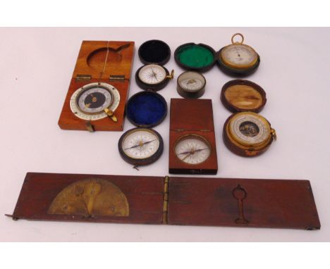 A quantity of scientific collectables to include compasses, barometer and a clinometer  (8)