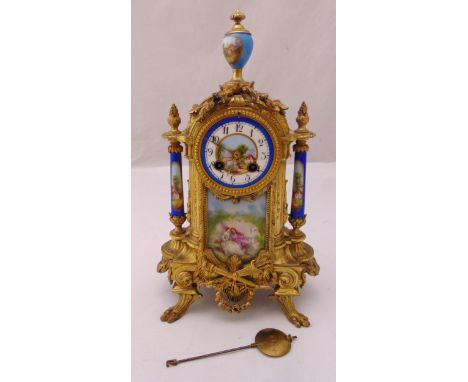 A French gilt metal and porcelain mantle clock, two train movement, to include pendulum, 37cm (h)