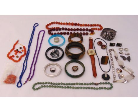A quantity of costume jewellery to include necklaces, bracelets, bangles, earrings and a ring