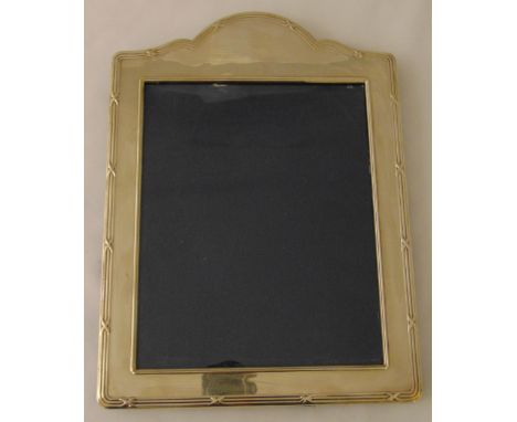 A hallmarked silver rectangular photograph frame with reed and tie borders, 36 x 26.5cm