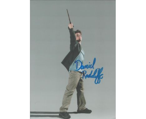 Daniel Radcliffe signed 7x5 inch Harry Potter colour photo. Good condition. All autographs come with a Certificate of Authent