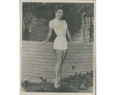 Mitzi Gaynor signed 10x8 inch vintage black and white photo dedicated with original mailing envelope. Good condition. All aut