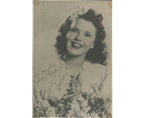 Shirley Temple signed 6x4 inch vintage black and white photo. Good condition. All autographs come with a Certificate of Authe