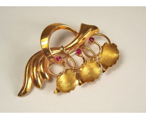 RUBY BROOCH.
An 18ct. gold ruby set brooch. (Approx. 7.9g)