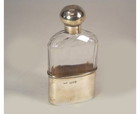 SPIRIT FLASK.
A silver mounted cut glass spirit flask with screw top. London 1897.
Height 12cm.