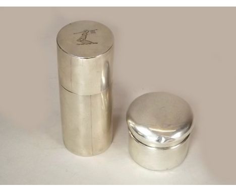 SILVER CASES.
An Edwardian silver shaving stick case, retailed by Fisher, 108 Strand, London, the lid with an armorial, Londo