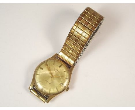 ROTARY WATCH.
A gentleman's yellow metal cased Rotary wristwatch with date aperture.