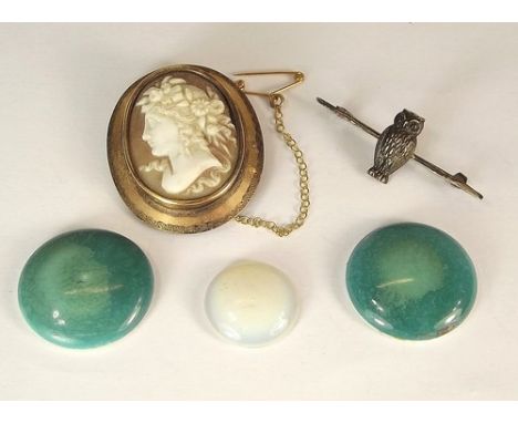 COSTUME JEWELLERY ETC.
A cameo brooch, a silver owl bar brooch, two ceramic Ruskin type roundels etc.