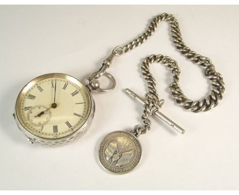 POCKET WATCH & CHAIN.
A German silver pocket watch with silver graduated curb link watch chain & fob commemorating May 31st 1
