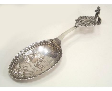 EUROPEAN SPOON.
A large European silver spoon, with cast bowl & bear finial. Import marks for London 1895.