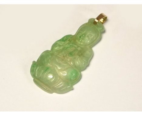 JADE PENDANT.
A gold mounted, pale green carved jade Buddha pendant. Length 3cm.