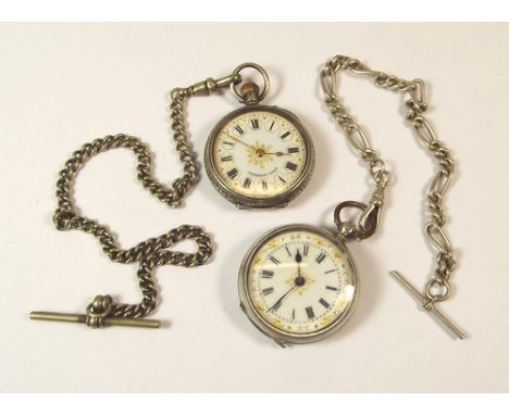 WATCHES & CHAINS.
Two silver cased fob watches, one with sterling silver fancy link chain, the other, a plated chain.
