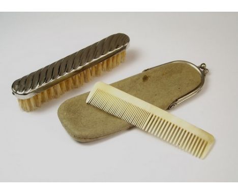 MINIATURE BRUSH ETC.
A miniature brush in a case & a miniature horn comb.