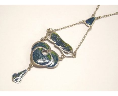 ENAMEL PENDANT.
An Art Nouveau style silver & enamelled pendant. Length of drop 8cm.