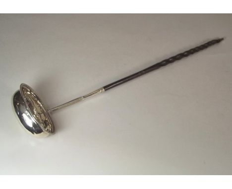 PUNCH LADLE.
A late 18th century silver punch ladle, with beaded decoration & twisted whalebone handle. Thomas Morley, London