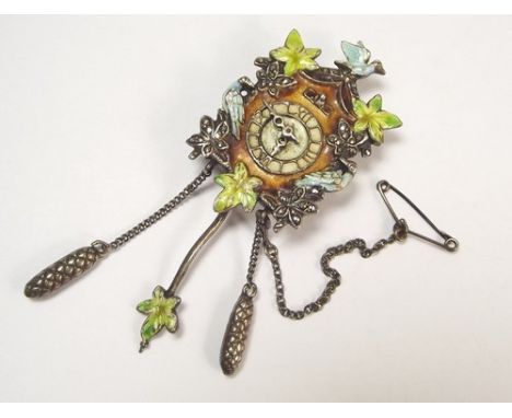 MARCASITE & ENAMEL BROOCH.
An unusual marcasite & enamelled cuckoo clock novelty brooch, complete with moveable pendulum, wei