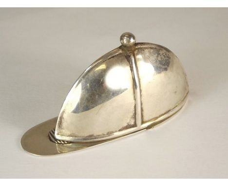 VESTA CASE.
An American, sterling silver jockey cap vesta case.