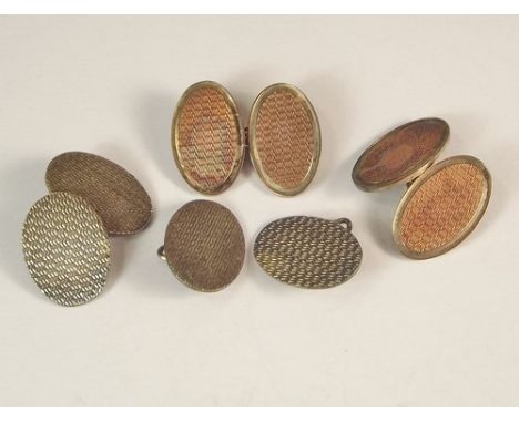 CUFFLINKS.
A pair of 9ct. gold on silver cufflinks & a pair of engine turned silver cufflinks.