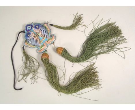 CHINESE PENDANT.
A Chinese enamelled, twin fish pendant, hung with embroidered silk tassels. Length of enamel 6.5cm. Full len