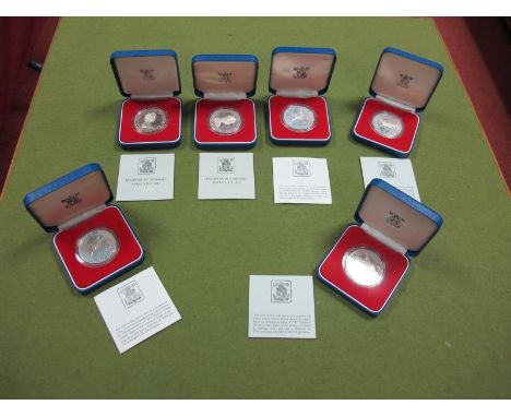 4 x 1977 Silver Proof Crowns and 2 x Guernsey Silver Proof Crowns. All of the coins in this lot are in their Royal Mint cases