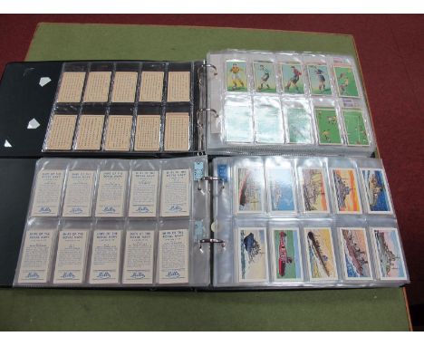 A Multithematic Collection of Cigarette and Non Tobacco Trade Cards in Two Very Well Filled Albums. The cards very regularly 