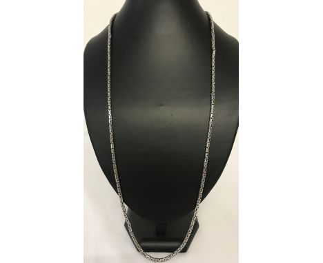 A long byzantine style chain necklace with S hook claps. Clasp marked "Indonesia 925 BA". Length approx. 28 inches. Total wei