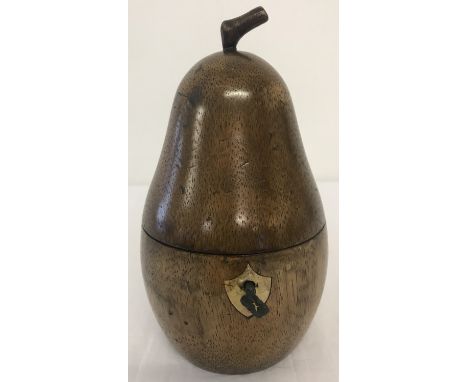 A Georgian style fruitwood tea caddy in the shape of a pear, complete with key.  Approx. 19cm tall.