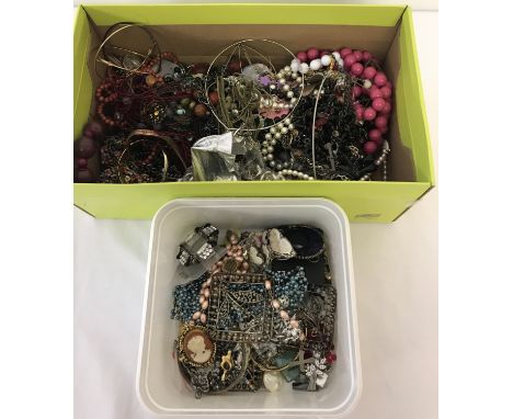 2 boxes of mixed vintage and modern costume jewellery to include brooches, necklaces and bracelets.  Being sold on behalf of 