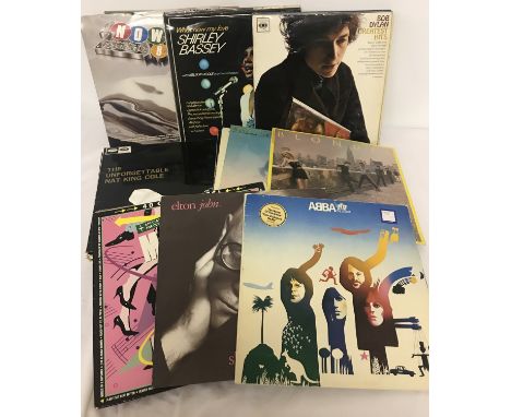 A collection of assorted vintage vinyl LP's to include: Abba, Paul McCartney and Shirley Bassey. Lot also includes: Now That'