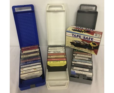 3 vintage plastic carry cases containing 32 assorted cassette tapes. To include: James Last, Frank Sinatra, Bananarama and cl
