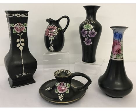 5 pieces of black painted ceramics by Shelley. Comprising: 2 vases with rose decoration, a candlestick with rose decoration, 