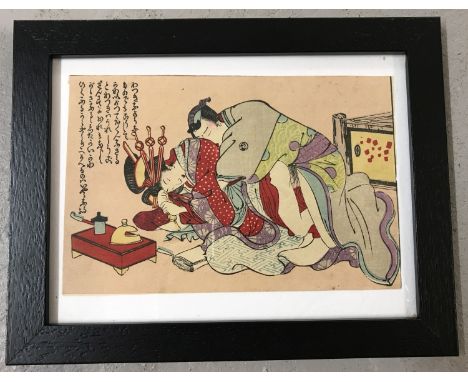A framed and glazed antique Japanese Shunga woodblock erotic print of the Edo period, c. 1850. Depicting a man and woman in e