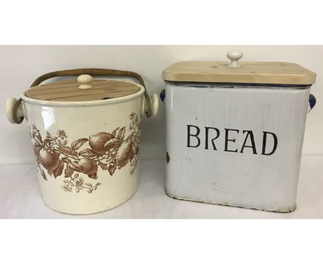 A vintage enamel bread bin together with a Victorian ceramic pail. Both with wooden lids. Pail is by BWM &amp; Co in the "Lem