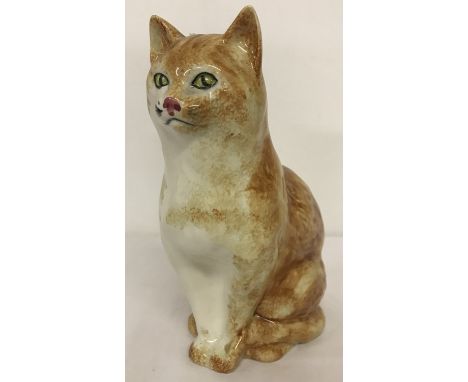 A Raymond Potteries ceramic figurine of a ginger cat.  Approx. 20cm tall.