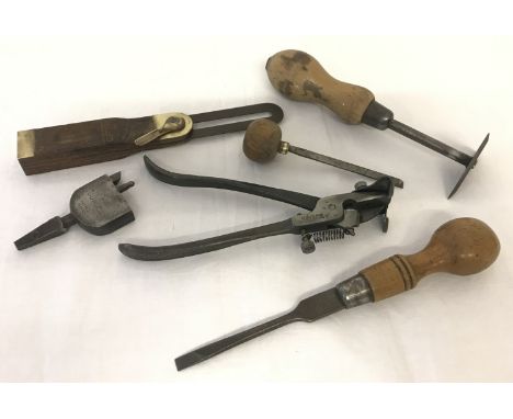 A collection of vintage tools. Comprising a palm-held 1/4in. Chisel; a "Boroll" adjustable boring bit; a Mather &amp; Son scr