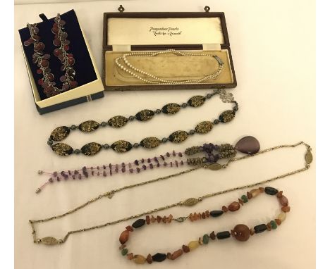 A collection of 6 boxed and unboxed vintage and modern necklaces. To include natural stone and faux pearl. 