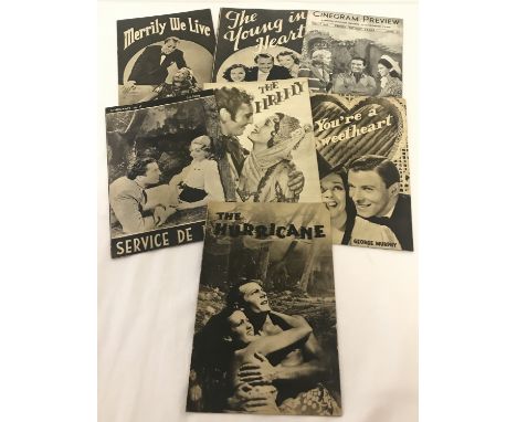 A collection of vintage Cinegram Film preview magazines. To include "The Young In Heart", "Merrily We Live" and "French Witho