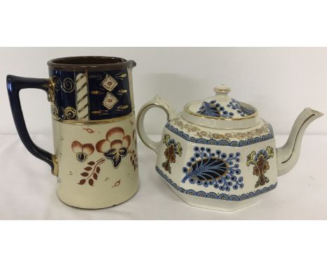 A decorative ceramic Sadler jug together with a  colourful Gibsons teapot.  