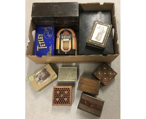 A box of assorted vintage tins and wooden boxes. To include inlaid and carved examples. 