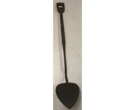 A vintage turfing spade, stamped Brades Co.  Total length approx. 138cm.