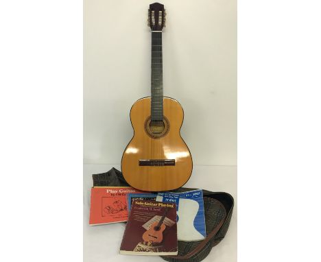 A vintage 6 string acoustic guitar by Angelica #2852 complete with fabric carrycase. Together with a collection of guitar mus